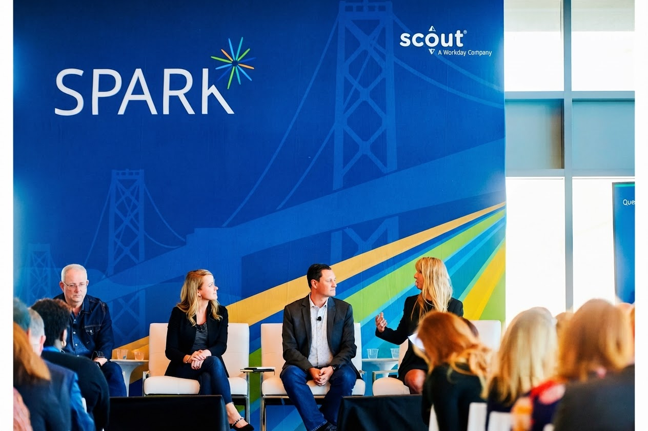 People on a panel talk at the Spark Customer Event