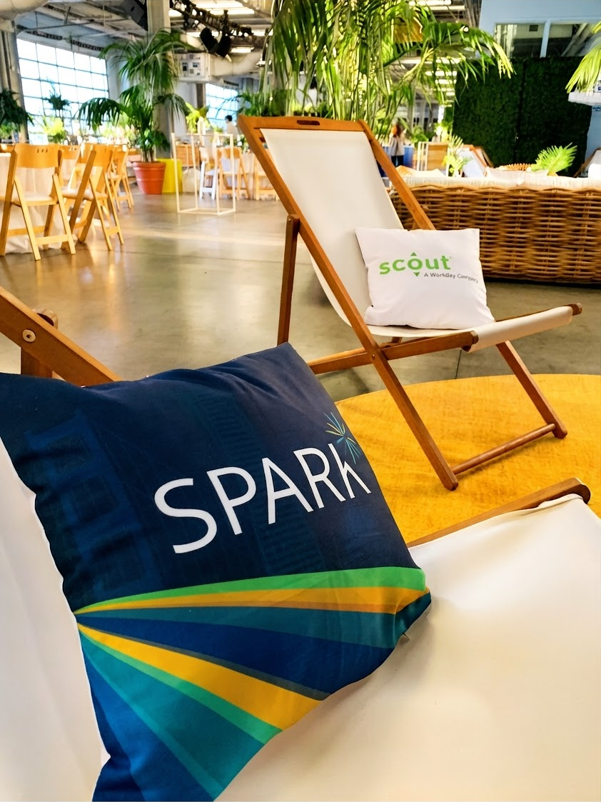 Seat cushions and chairs with the Spark Customer Event branding